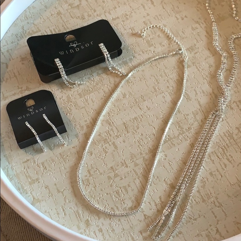 2 necklaces and 2 pair of earrings